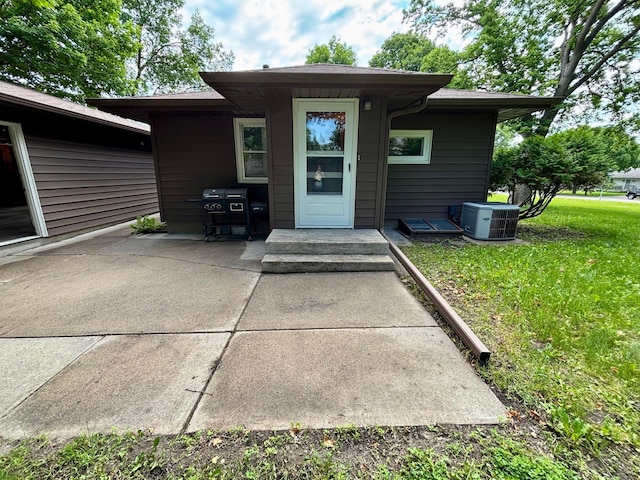 1116 Whitford St, Fergus Falls, MN 56537 - property entrance with a lawn and a patio area