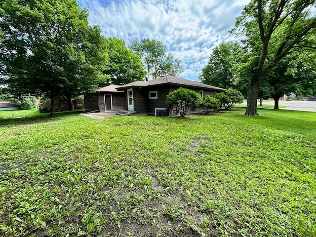 1116 Whitford St, Fergus Falls, MN 56537 - view of green lawn with a patio