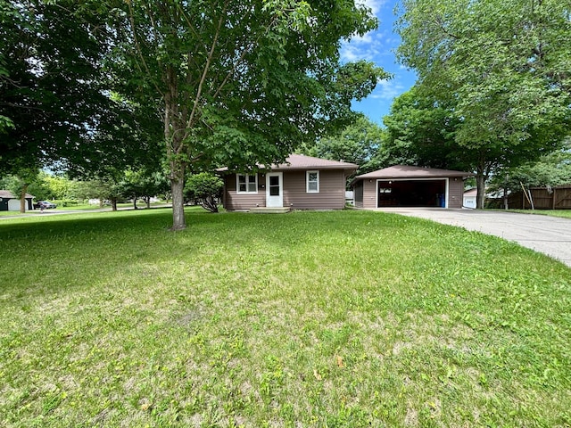 1116 Whitford St, Fergus Falls, MN 56537 - ranch-style home featuring a garage, an outbuilding, and a front lawn