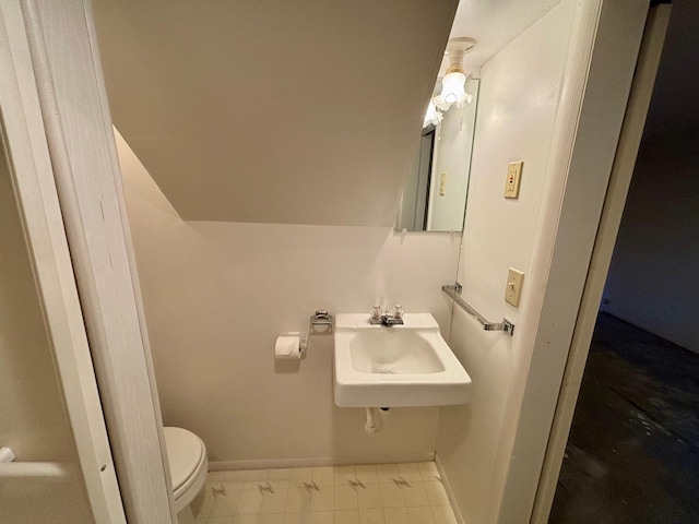 1116 Whitford St, Fergus Falls, MN 56537 - half bathroom with toilet and baseboards
