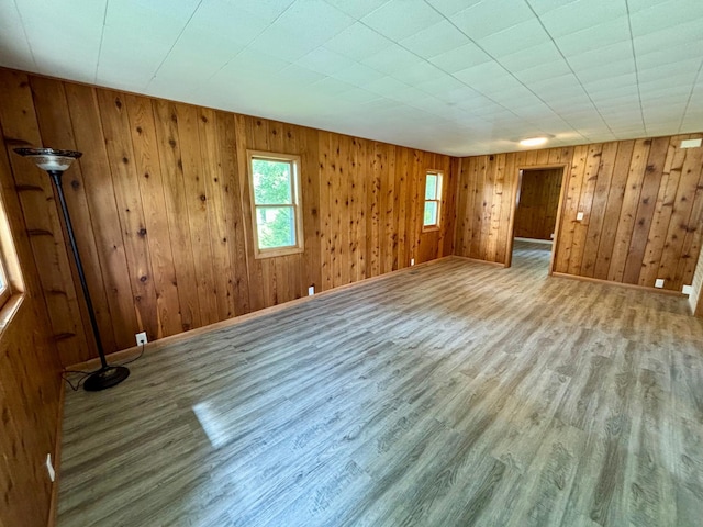 1116 Whitford St, Fergus Falls, MN 56537 - empty room featuring wood finished floors and wooden walls