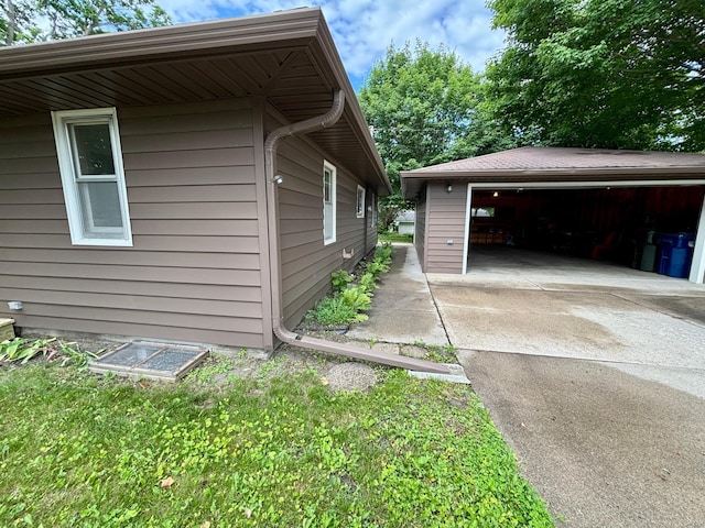1116 Whitford St, Fergus Falls, MN 56537 - view of side of home featuring a garage and an outdoor structure