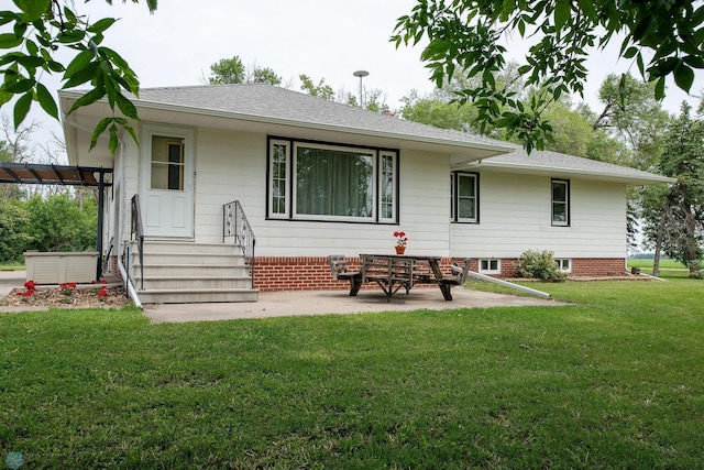 5555 167th Ave SE, Walcott, ND 58051 - rear view of property featuring a yard, a patio, entry steps, and roof with shingles