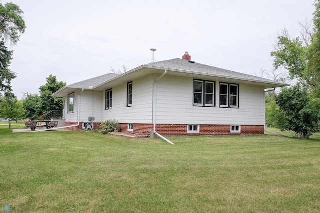 5555 167th Ave SE, Walcott, ND 58051 - view of side of home featuring a yard and a chimney
