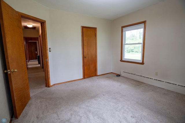 5555 167th Ave SE, Walcott, ND 58051 - unfurnished bedroom featuring carpet flooring, a baseboard heating unit, and baseboards