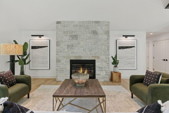 6608 Pawnee Rd, Edina, MN 55439 - living room with wood finished floors and a stone fireplace