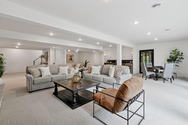 6608 Pawnee Rd, Edina, MN 55439 - living room with light colored carpet, recessed lighting, and beverage cooler
