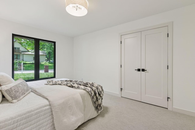 6608 Pawnee Rd, Edina, MN 55439 - bedroom featuring light colored carpet and baseboards