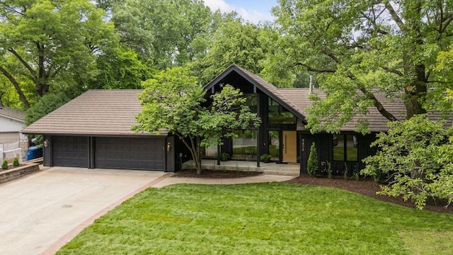 6608 Pawnee Rd, Edina, MN 55439 - view of front of property featuring a front yard, driveway, a tile roof, and an attached garage
