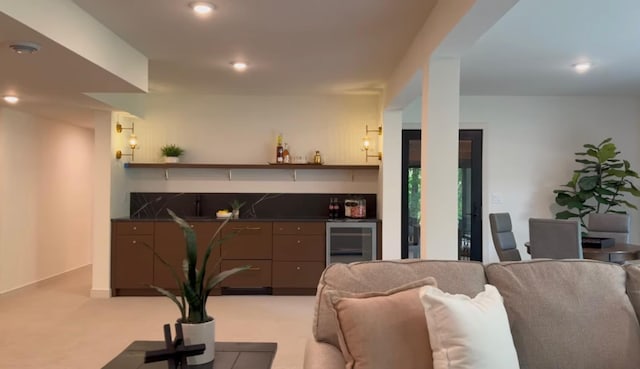 6608 Pawnee Rd, Edina, MN 55439 - carpeted living room featuring beverage cooler, a dry bar, and recessed lighting