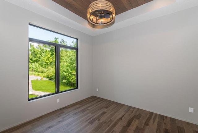 19923 See Gull Rd, Brainerd, MN 56401 - unfurnished room featuring a tray ceiling, wood finished floors, wood ceiling, a chandelier, and baseboards