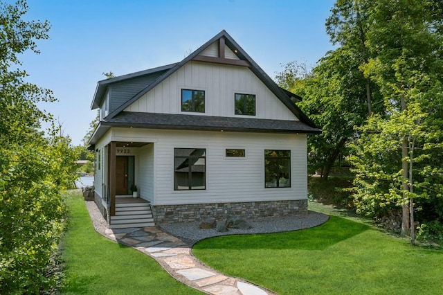 19923 See Gull Rd, Brainerd, MN 56401 - back of property featuring board and batten siding, a yard, and roof with shingles