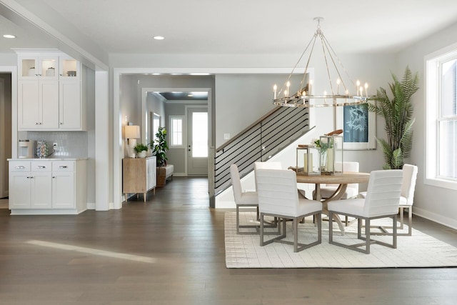 6501 Timber Arch Dr, Chaska, MN 55318 - dining room with stairs, dark wood-type flooring, a chandelier, recessed lighting, and baseboards