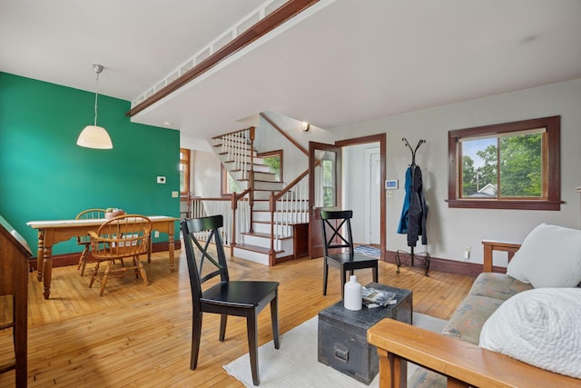3015 22nd St, Minneapolis, MN 55406 - living room featuring stairway and hardwood / wood-style flooring