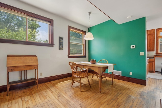 3015 22nd St, Minneapolis, MN 55406 - dining room featuring light wood-type flooring and baseboards