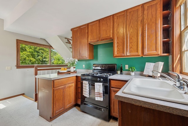 3015 22nd St, Minneapolis, MN 55406 - kitchen with black gas range, open shelves, a peninsula, and brown cabinets