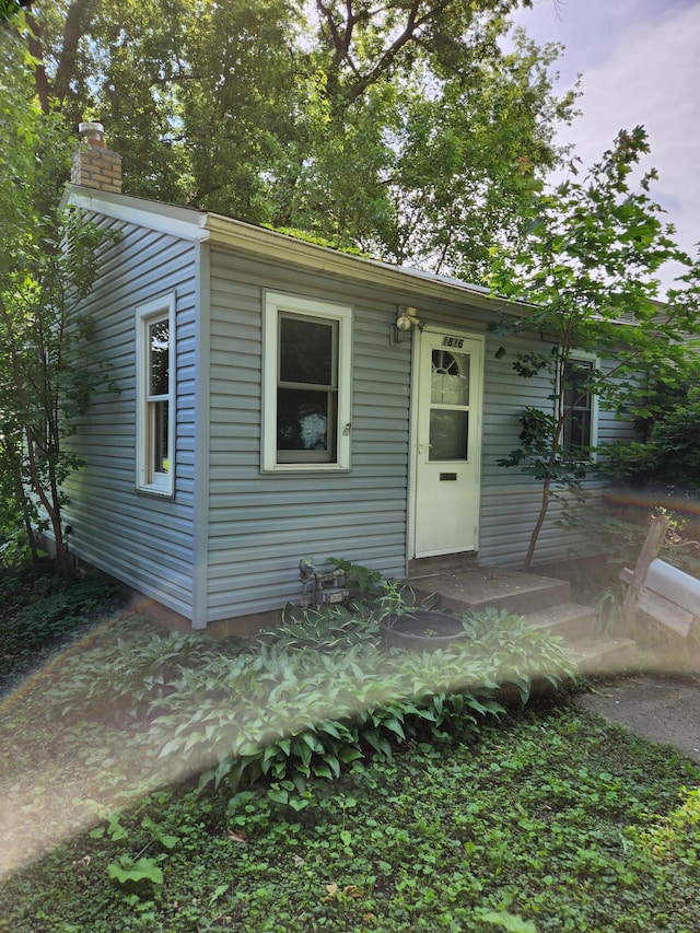1816 Malvern St, Lauderdale, MN 55113 - view of front facade with a chimney