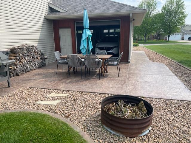 409 Iris Ln NE, Saint Joseph, MN 56374 - view of patio / terrace with outdoor dining space