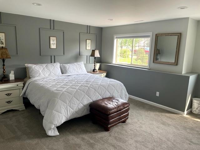 409 Iris Ln NE, Saint Joseph, MN 56374 - bedroom featuring carpet floors and baseboards