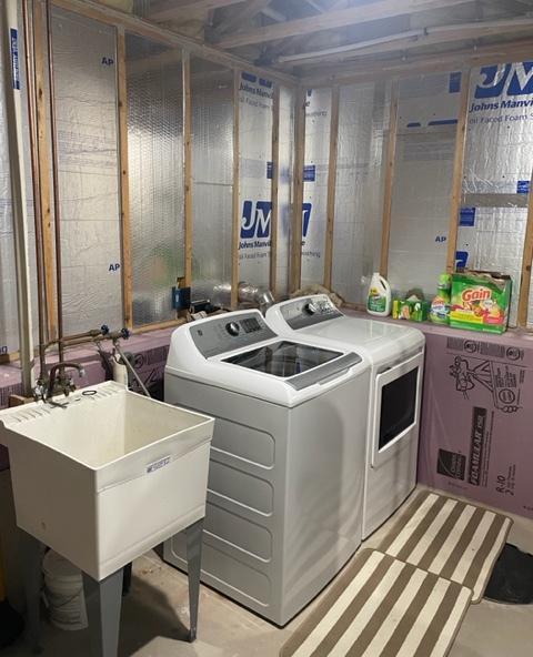 409 Iris Ln NE, Saint Joseph, MN 56374 - washroom with independent washer and dryer