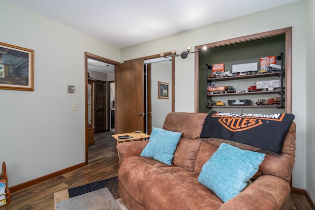 701 Mill St, Fertile, MN 56540 - living room with wood finished floors, baseboards, and a barn door