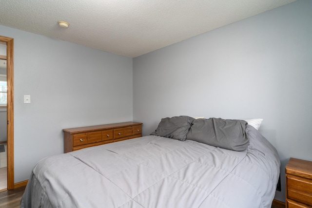 501 Thompson Ave, Fisher, MN 56723 - bedroom with dark wood-type flooring
