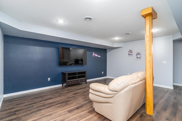 501 Thompson Ave, Fisher, MN 56723 - living area featuring wood finished floors, a textured ceiling, baseboards, and recessed lighting