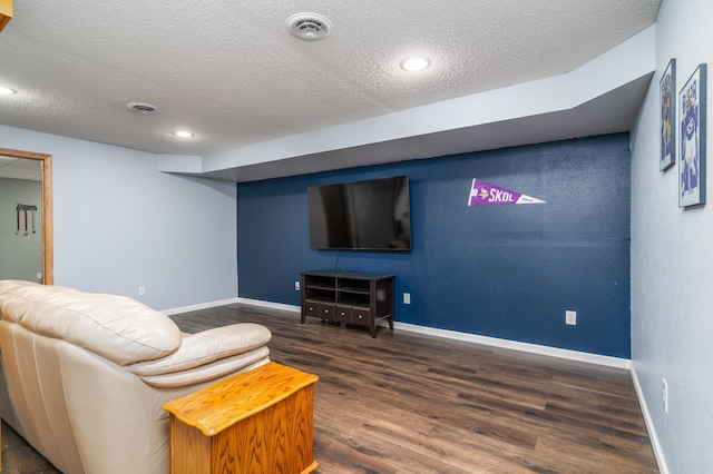 501 Thompson Ave, Fisher, MN 56723 - living room with a textured ceiling, wood finished floors, baseboards, and recessed lighting