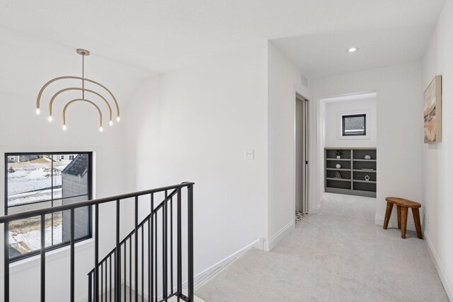 10154 Peony Ln N, Maple Grove, MN 55311 - hallway featuring an upstairs landing, light carpet, baseboards, a chandelier, and recessed lighting