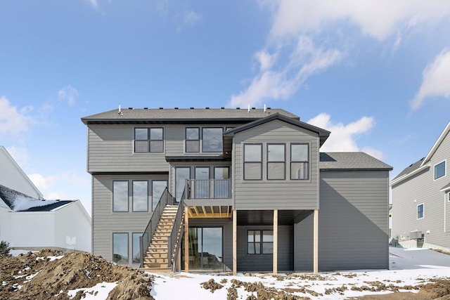 10154 Peony Ln N, Maple Grove, MN 55311 - snow covered property featuring stairs