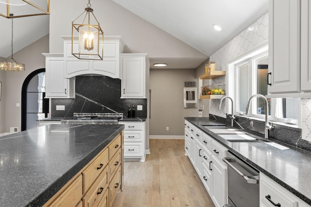 6141 Sherman Cir, Edina, MN 55436 - kitchen featuring dishwasher, a chandelier, light wood-type flooring, pendant lighting, and open shelves