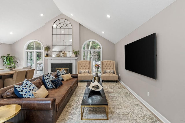 6141 Sherman Cir, Edina, MN 55436 - living room with high vaulted ceiling, plenty of natural light, a large fireplace, and recessed lighting