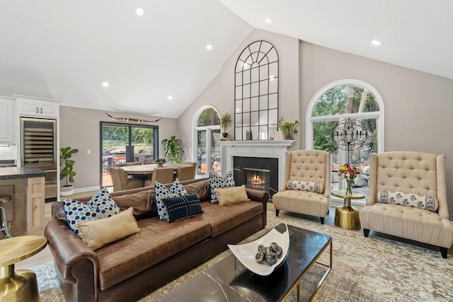 6141 Sherman Cir, Edina, MN 55436 - living area with beverage cooler, high vaulted ceiling, recessed lighting, and a fireplace