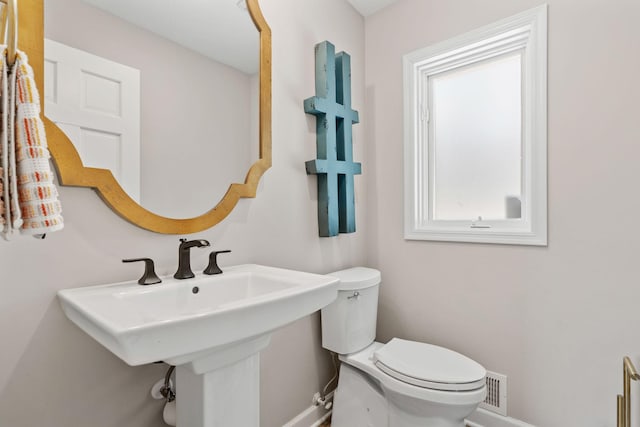 6141 Sherman Cir, Edina, MN 55436 - half bath with baseboards and toilet