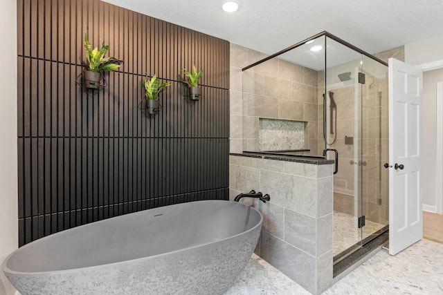 6141 Sherman Cir, Edina, MN 55436 - bathroom featuring a freestanding tub, a shower stall, and recessed lighting