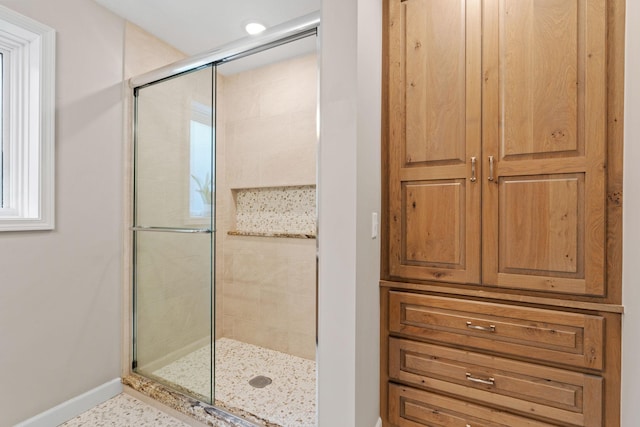 6141 Sherman Cir, Edina, MN 55436 - full bathroom featuring baseboards and a shower stall