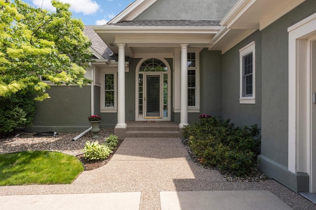 1540 Waterford Ct, Golden Valley, MN 55422 - doorway to property with stucco siding and a shingled roof