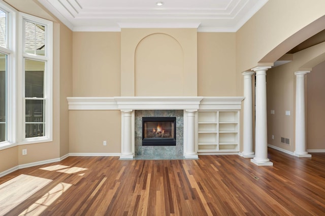 1540 Waterford Ct, Golden Valley, MN 55422 - unfurnished living room with wood finished floors, a tile fireplace, decorative columns, baseboards, and crown molding