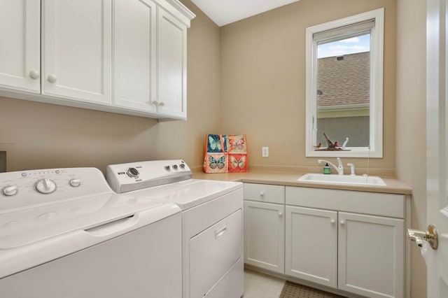 1540 Waterford Ct, Golden Valley, MN 55422 - laundry area featuring washing machine and clothes dryer and cabinet space