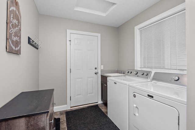 17051 Lupine Ln, Big Lake, MN 55309 - laundry room featuring independent washer and dryer, cabinet space, and baseboards