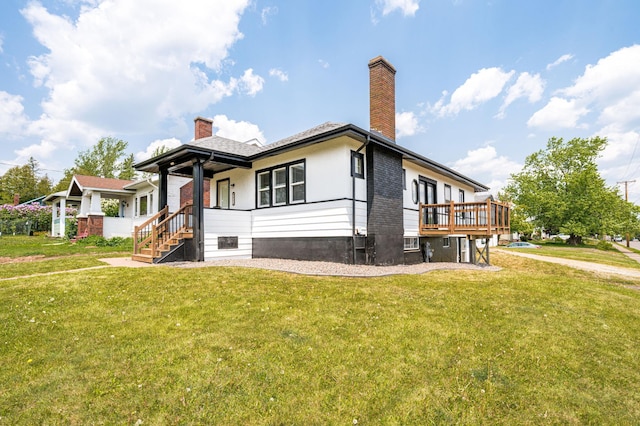 804 20th Ave E, Duluth, MN 55812 - view of side of home featuring a lawn and a chimney