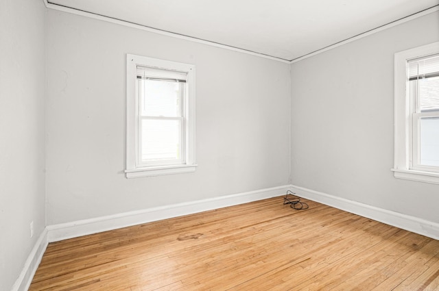 804 20th Ave E, Duluth, MN 55812 - unfurnished room featuring wood finished floors and baseboards