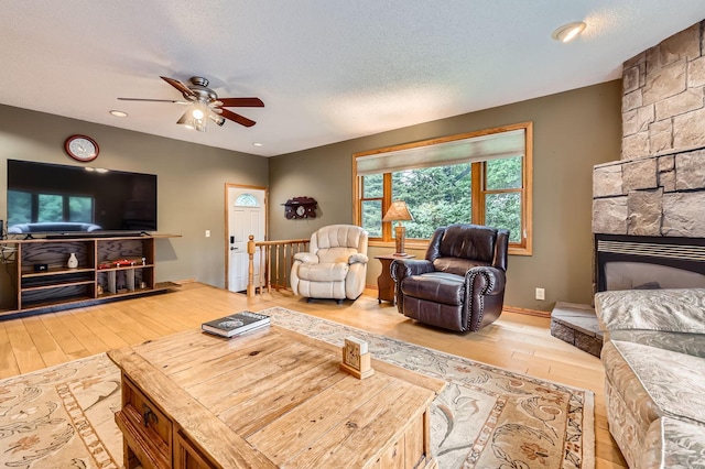 5959 373rd St, North Branch, MN 55056 - living area featuring wood finished floors, ceiling fan, recessed lighting, and a textured ceiling