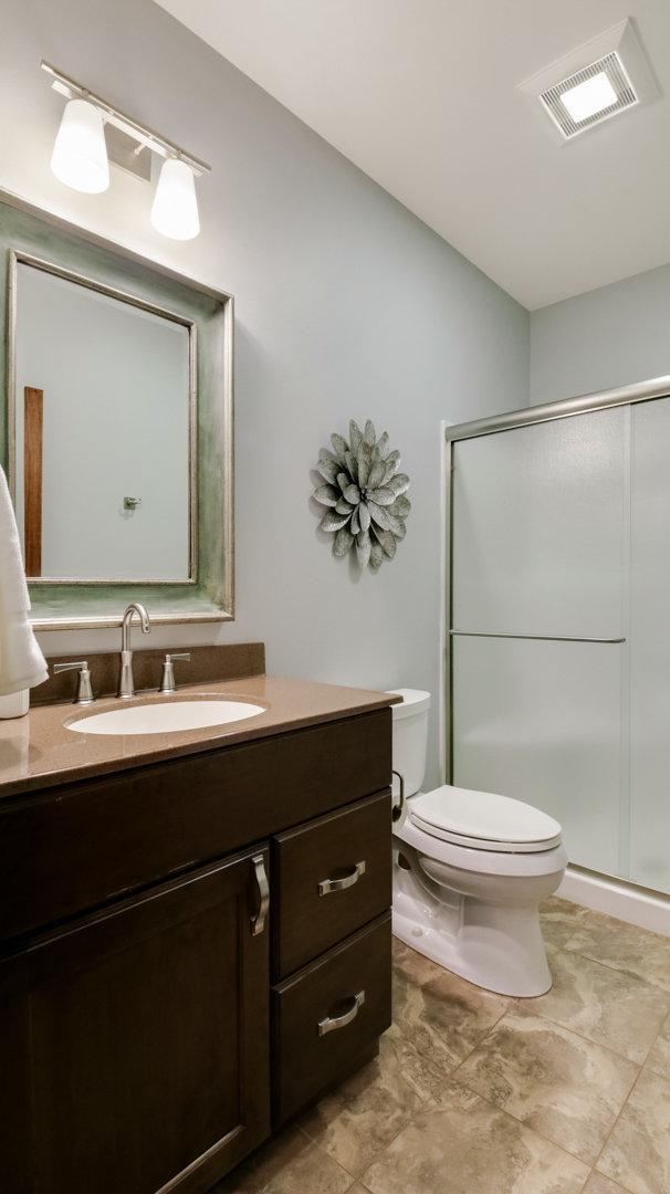 904 Timber View Dr, Altoona, WI 54720 - bathroom with vanity, toilet, and a shower stall