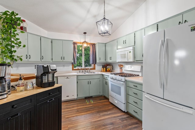 13610 Prairie Ct, Becker, MN 55308 - kitchen with white appliances, light countertops, dark wood-style floors, decorative light fixtures, and a chandelier