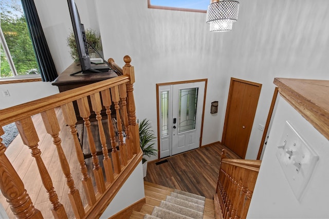 13610 Prairie Ct, Becker, MN 55308 - entryway featuring wood finished floors, stairs, and a high ceiling