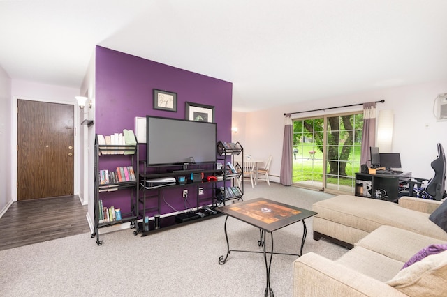 1006 Westbrooke Way Unit 2, Hopkins, MN 55343 - carpeted living room featuring a desk and baseboard heating