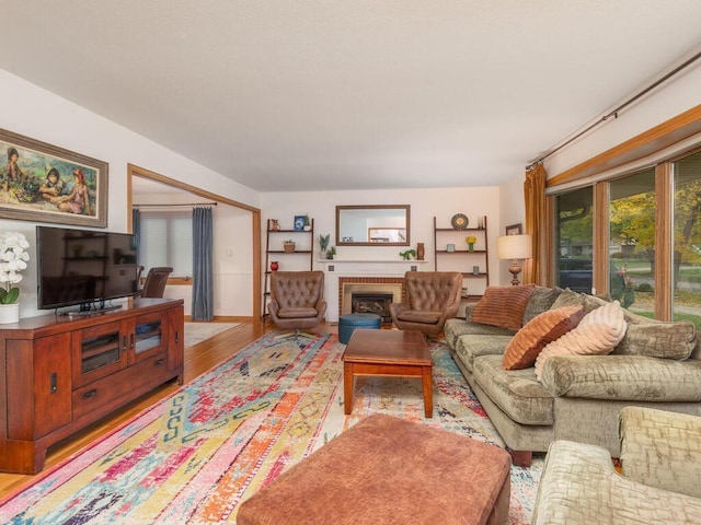 9300 23rd St, Saint Louis Park, MN 55426 - living area featuring light wood-type flooring and a fireplace