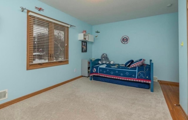 9300 23rd St, Saint Louis Park, MN 55426 - bedroom featuring baseboards and carpet floors