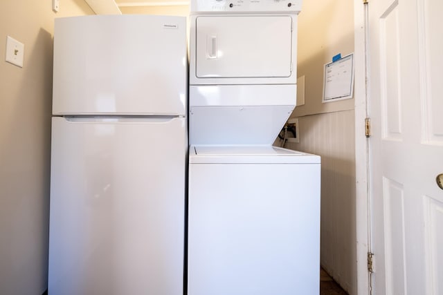 8247 Wentworth Ave S, Bloomington, MN 55420 - washroom featuring estacked washer and dryer